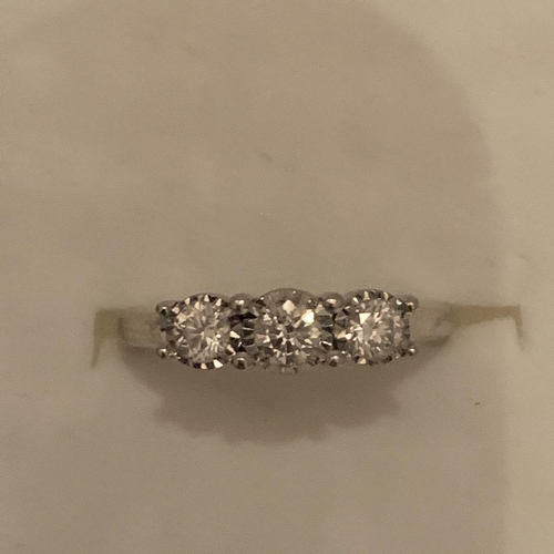 614 - 9CT HALLMARKED WHITE GOLD DIAMOND TRILOGY RING ILLUSION SET. TOTAL GROSS WEIGHT 3 GRAMS