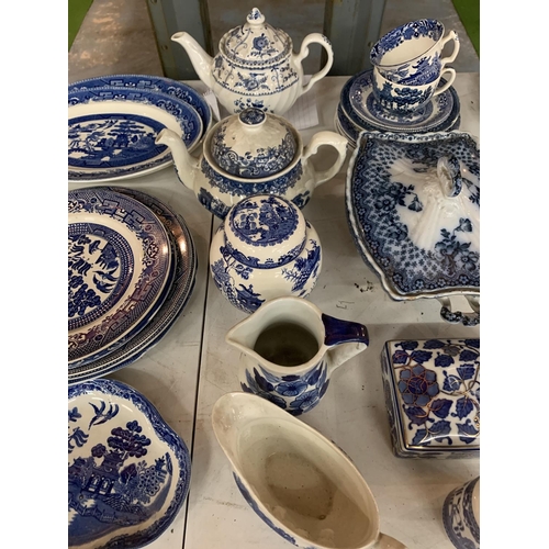 715 - COLLECTION OF BLUE AND WHITE WILL PATTERN WARES, TEAPOTS, PLATES, JUGS, CUPS AND SAUCERS ETC