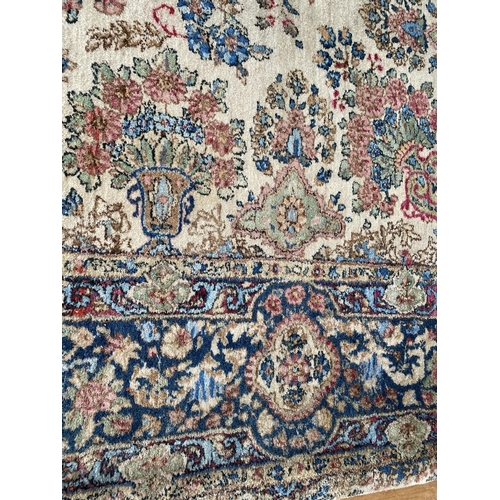 1486 - A LARGE BLUE PATTERNED RUG 394 CM X 282 CM