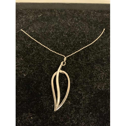 554 - MODERN LEAF SHAPED PENDANT AND NECKLACE MARKED 925 SILVER