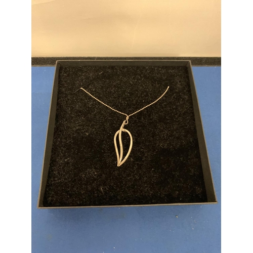 554 - MODERN LEAF SHAPED PENDANT AND NECKLACE MARKED 925 SILVER