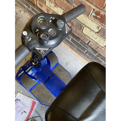 1240 - A PRIDE ELITE MOBILITY SCOOTER WITH CHARGER - IN GOOD CONDITION AND WORKING ORDER