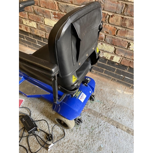 1240 - A PRIDE ELITE MOBILITY SCOOTER WITH CHARGER - IN GOOD CONDITION AND WORKING ORDER