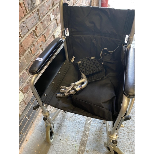 1241 - AN ENIGMA WHEELCHAIR IN GOOD CONDITION