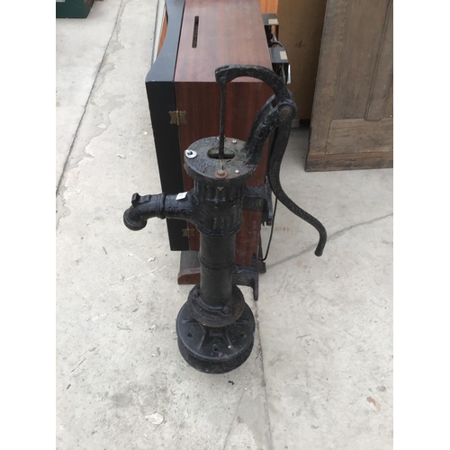 1002 - A BLACK CAST IRON WATER PUMP