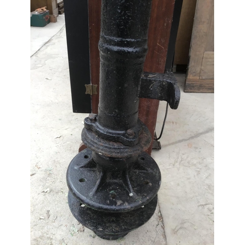 1002 - A BLACK CAST IRON WATER PUMP