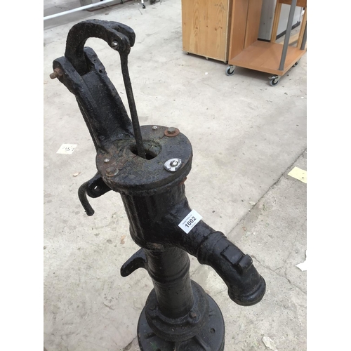 1002 - A BLACK CAST IRON WATER PUMP