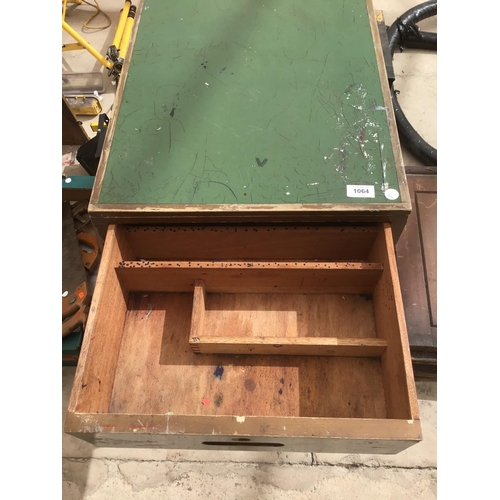 1064 - A GREEN TOPPED WOODEN CABINET WITH TWO DRAWERS AND A LOWER DOOR