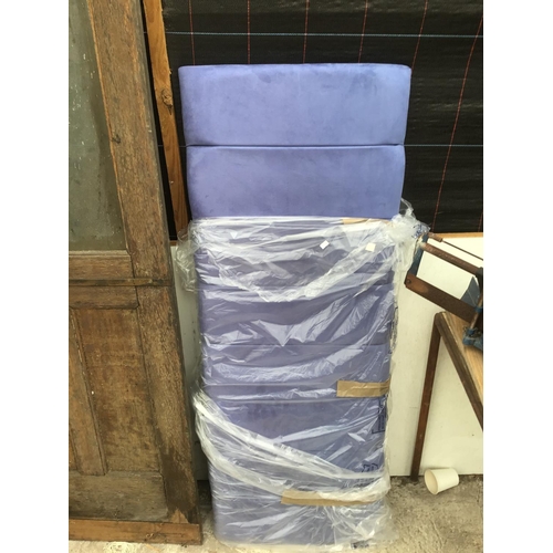 1085 - A NEW BLUE SEUDETTE DOUBLE HEADBOARD AND AN IRONING BOARD