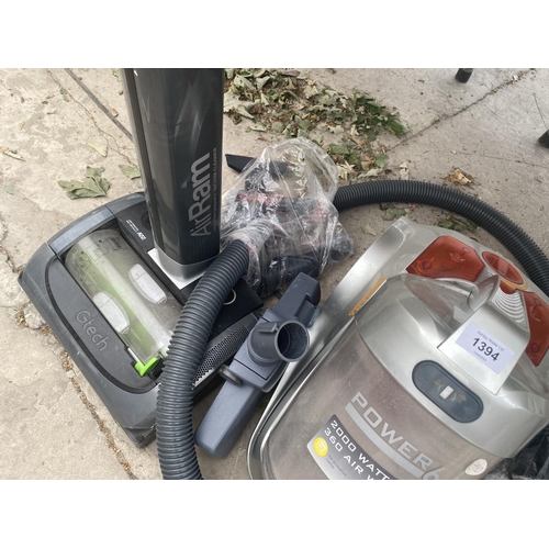 1394 - A GTECH AND A POWER 6 VACUUM CLEANER (NOT TESTED)