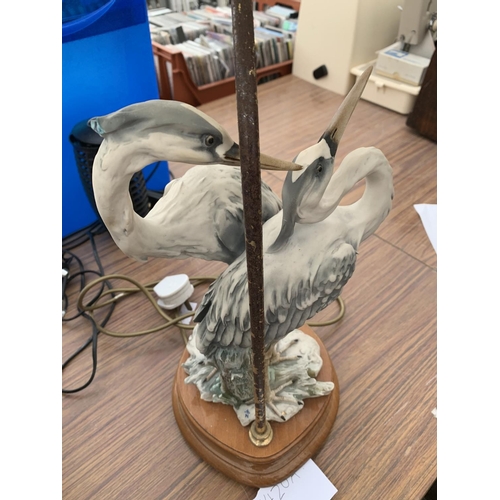 1204A - A CERAMIC PAIR OF HERONS TABLE LAMP WITH MARK  ON A WOODEN BASE