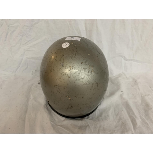 49 - A VINTAGE SILVER COLOURED CRASH HAT