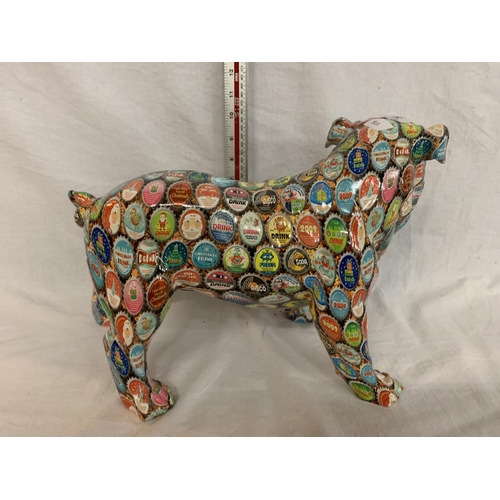 30 - A LARGE STANDING BULLDOG DECORATED WITH BOTTLE TOP DESIGN