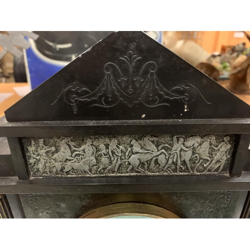 34 - AN ORNATE SLATE MANTLE CLOCK