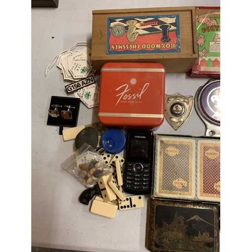 43 - A LARGE COLLECTION OF ITEMS TO INCLUDE PLAYING CARDS, SCOUT BADGES, CUFFLINKS, PIGYBAK PUZZLE, WOODE... 