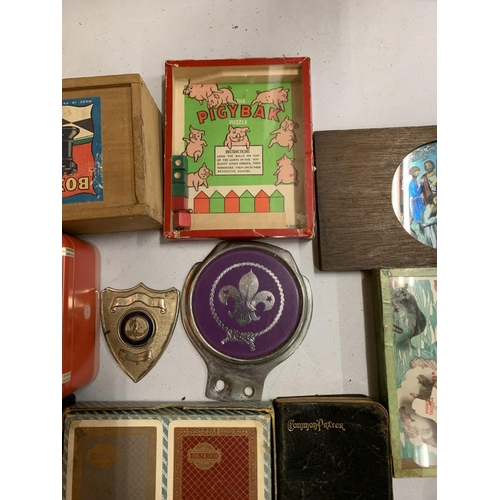 43 - A LARGE COLLECTION OF ITEMS TO INCLUDE PLAYING CARDS, SCOUT BADGES, CUFFLINKS, PIGYBAK PUZZLE, WOODE... 