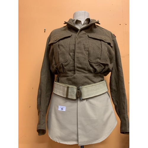 49 - A BRITISH ARMY BATTLE DRESS, SHIRT AND BELT