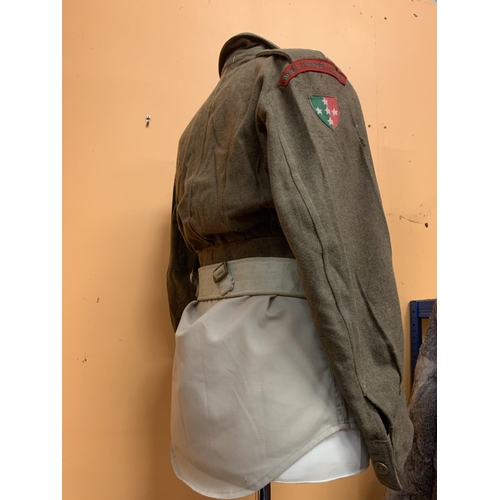 49 - A BRITISH ARMY BATTLE DRESS, SHIRT AND BELT