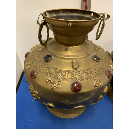 210 - TWO LARGE BRASS POTS WITH ASSORTED STONES ONE WITH ORNATE DETAILING