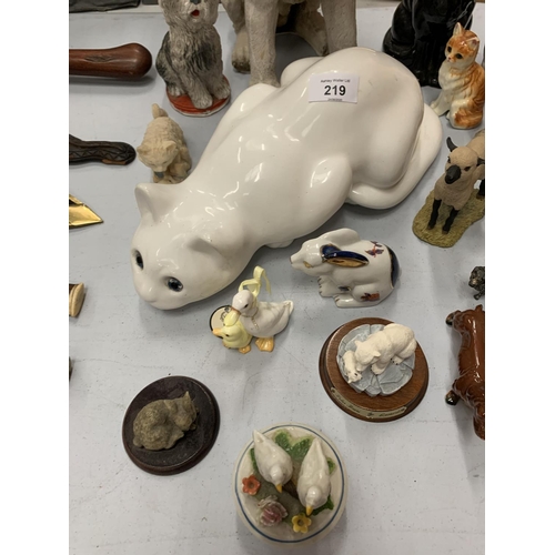 219 - A LARGE COLLECTION OF ANIMAL THEMED ORNAMENTS TO INCLUDE A LARGE JACK RUSSEL, CATS, BORDER FINE ART ... 