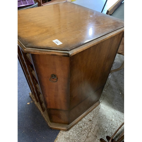 294 - A MAHOGANY WINE RACK WITH A CUPBOARD TO HOLD SIX WINE GLASSES