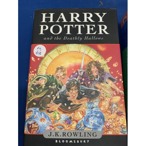 124 - TWO HARRY POTTER BOOKS 'HARRY POTTER AND THE DEATHLY HALLOWS' AND 'HARRY POTTER AND THE FIRST BLOOD ... 