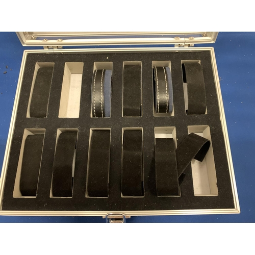 146 - A METAL CASE FOR THE STORAGE OF TWELVE WRISTWATCHES