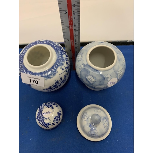 170 - TWO BLUE AND WHITE PAINTED LIDDED JARS ONE A/F (CRACK)