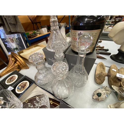 249 - EIGHT WATERFORD CRYSTAL GLASSES, FIVE DECANTERS, A TRAY AND A COGNAC ICE BUCKET