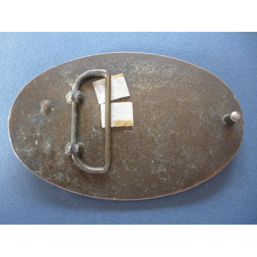 334 - A WOUNDED KNEE BELT BUCKLE AND ONE OTHER