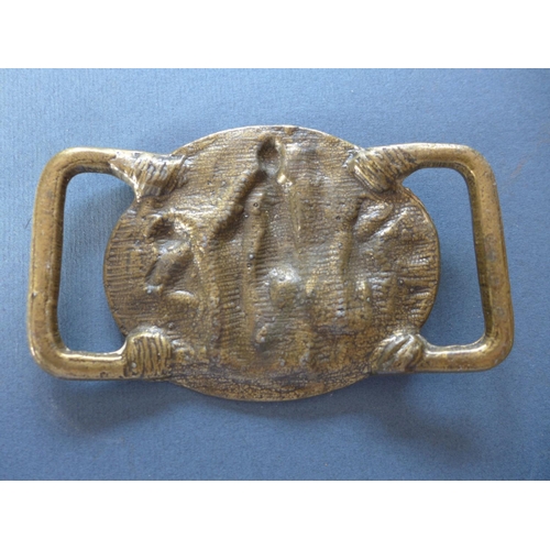 334 - A WOUNDED KNEE BELT BUCKLE AND ONE OTHER