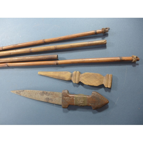 386 - A COLLECTION OF AFRICAN WEAPONS - A BOW, KNIFE, SPEARS ETC