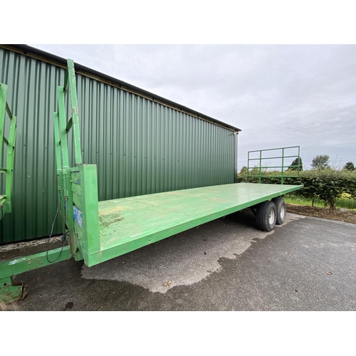 76 - A 24 FOOT TANDEM AXLE BALE TRAILER WITH CHEQUER PLATE FLOORS AND ON 12.5/80 15.3 14PLY TYRES ON A RO... 