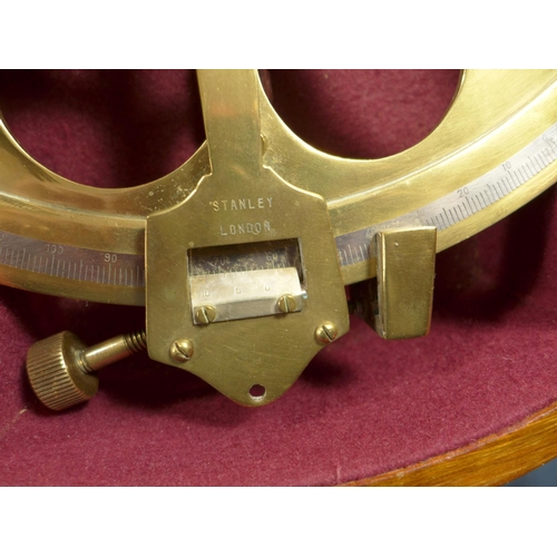 395 - A CASED SEXTANT, THE BRASS FRAME STAMPED STANLEY, LONDON - HEIGHT 19 CM