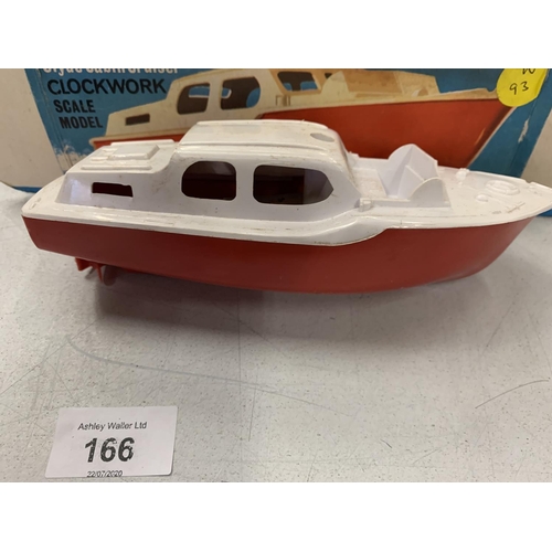 166 - TWO VINTAGE CHILDRENS' TOY BOATS TO INCLUDE A TRIANG DERWENT CABIN CRUISER AND A CLYDE CLOCKWORK CAB... 