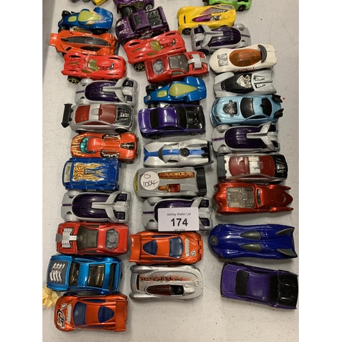 174 - A GROUP OF APPROXIMATELY 60 HOT WHEELS CARS