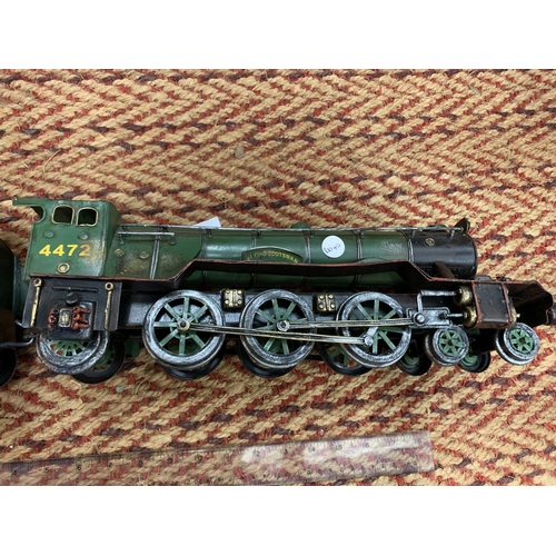 179 - A LARGE TIN PLATE STEAM ENGINE FLYING SCOTSMAN AND LNER TENDER