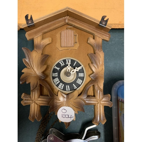 184 - A CUCKOO CLOCK AND FURTHER ITEMS