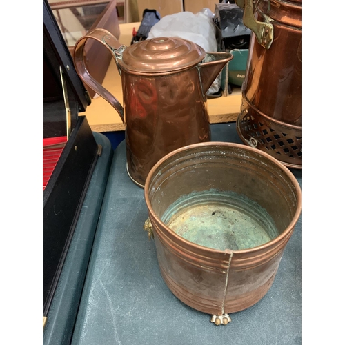 188 - FOUR COPPER AND BRASS ITEMS TO INCLUDE A TEA URN, JUGS AND PLANTER