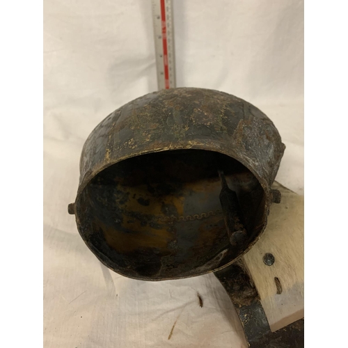 26 - A LARGE COW BELL WITH A COWHIDE STRAP