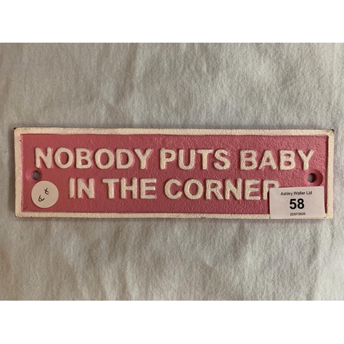 58 - A SMALL CAST VINTAGE STYLE 'NOBODY PUTS BABY IN THE CORNER' SIGN