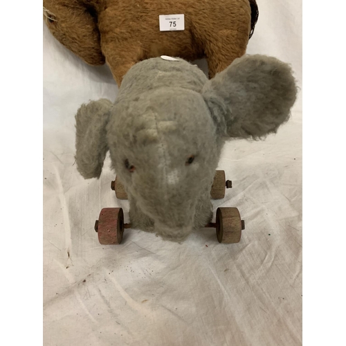 75 - TWO VINTAGE TEDDIES TO INCLUDE A HORSE AND AN ELEPHANT ON WHEELS