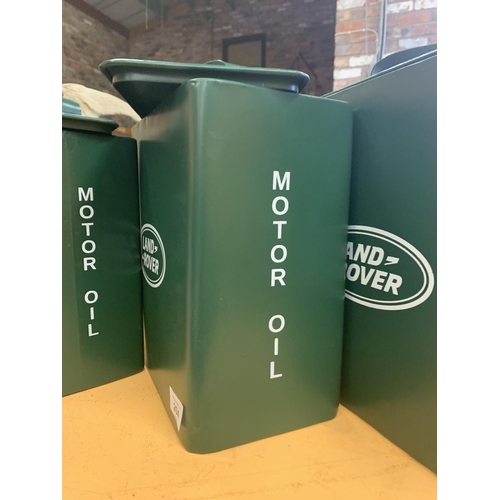 204 - A SET OF THREE GRADUATED VINTAGE STYLE REPRODUCTION METAL LAND ROVER GREEN MOTOR OIL PETROL CANS