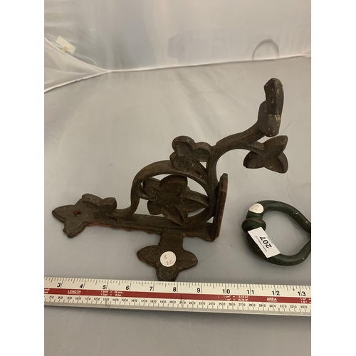 207 - A CAST WALL BRACKET AND DOOR KNOCKER