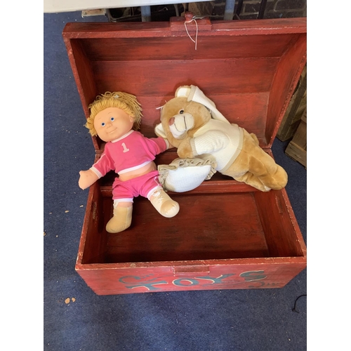 265 - A WOODEN TOY BOX PAINTED WITH TEDDY BEARS CONTAINING A DOLL AND A TEDDY