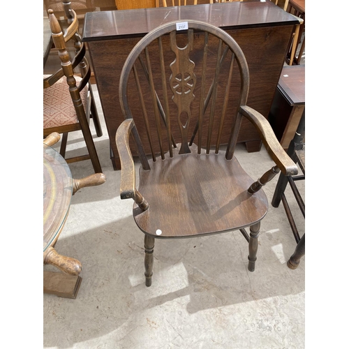 2137 - AN OAK WHEELBACK CARVER DINING CHAIR