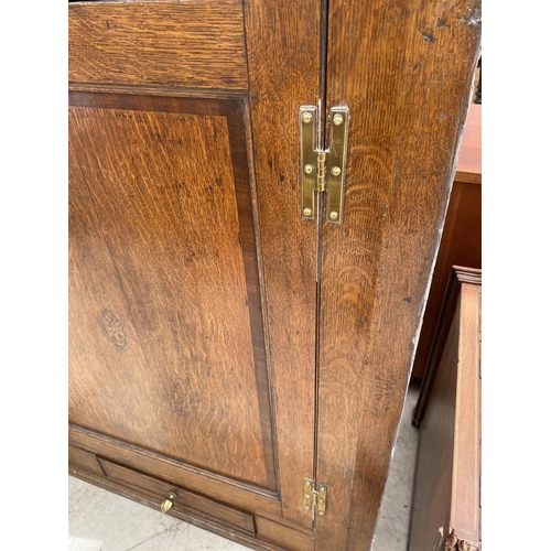 2139 - A GEORGIAN OAK FLAT FRONT CORNER CUPBOARD WITH ONE DOOR AND LOWER DRAWER