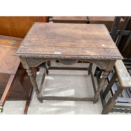 2141 - A VICTORIAN CARVED OAK SIDE TABLE