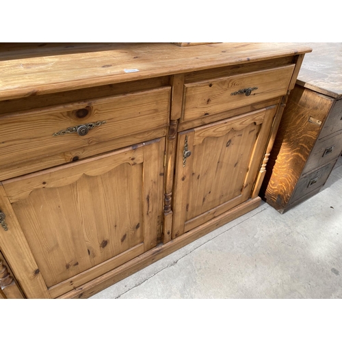 2158 - A PINE DRESSER WITH THREE DOORS, THREE DRAWERS AND TWO UPPER GLAZED DOORS