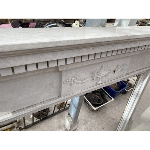 2160 - AN ORNATE WHITE PAINTED FIRE SURROUND